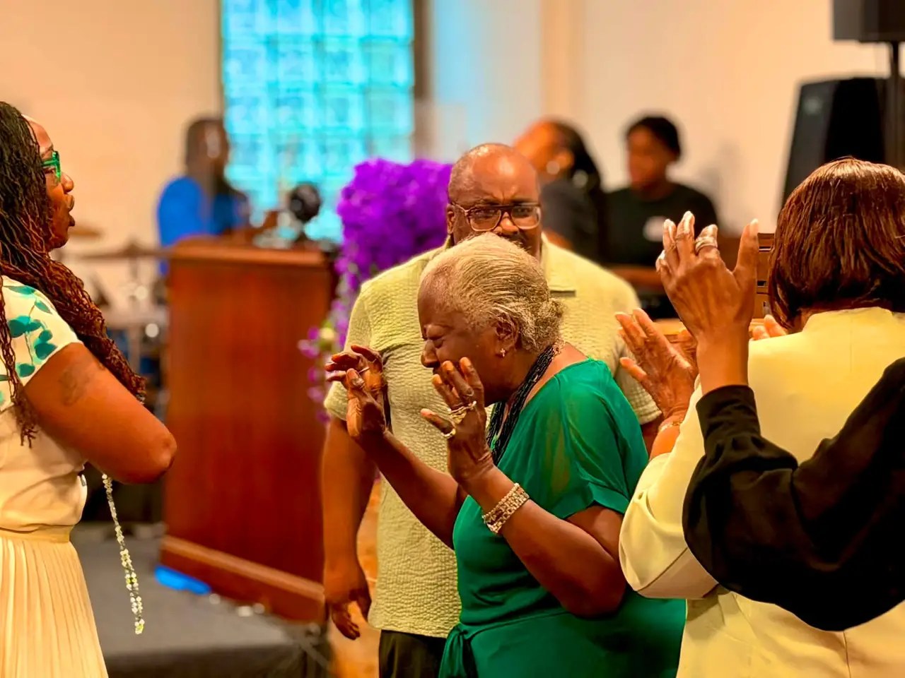 Church members worshipping.